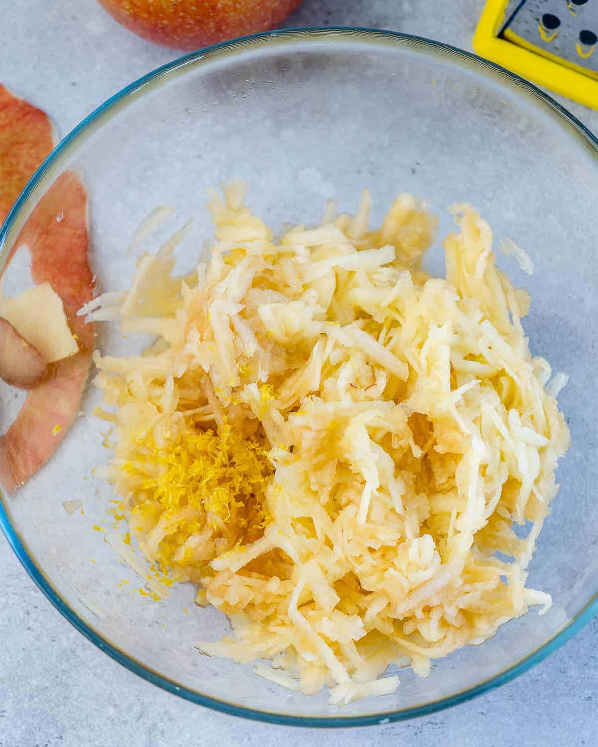 shredded apples in bowl