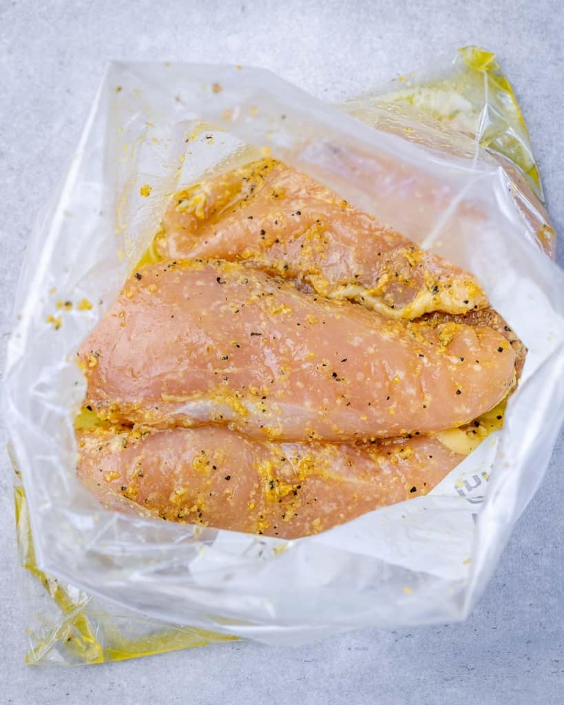 marinated chicken breast in a ziplock bag