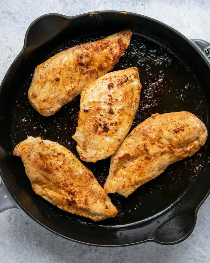 cooked chicken breast in the skillet
