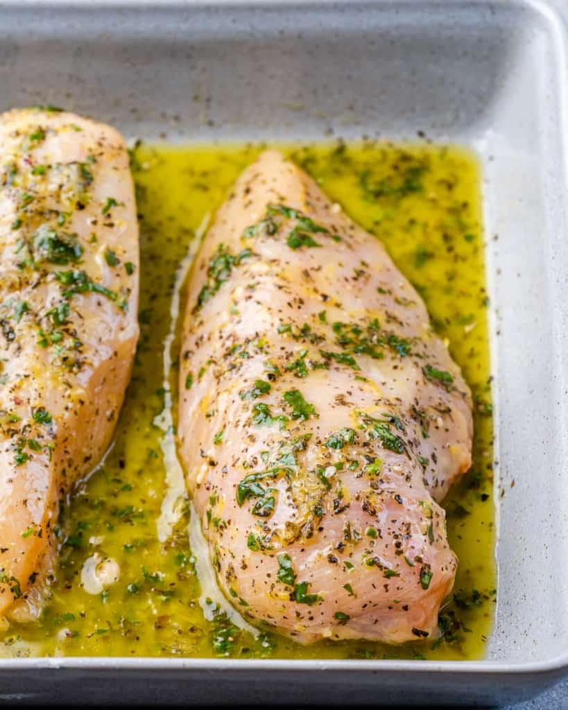 marinated greek chicken breast in a white dish