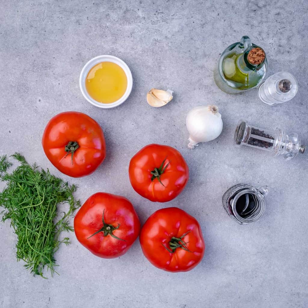 top view of ingredients needed to make marinated tomatoes 