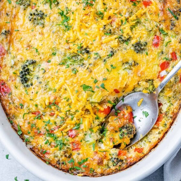 top view of broccoli cheese breakfast casserole with spoon in it