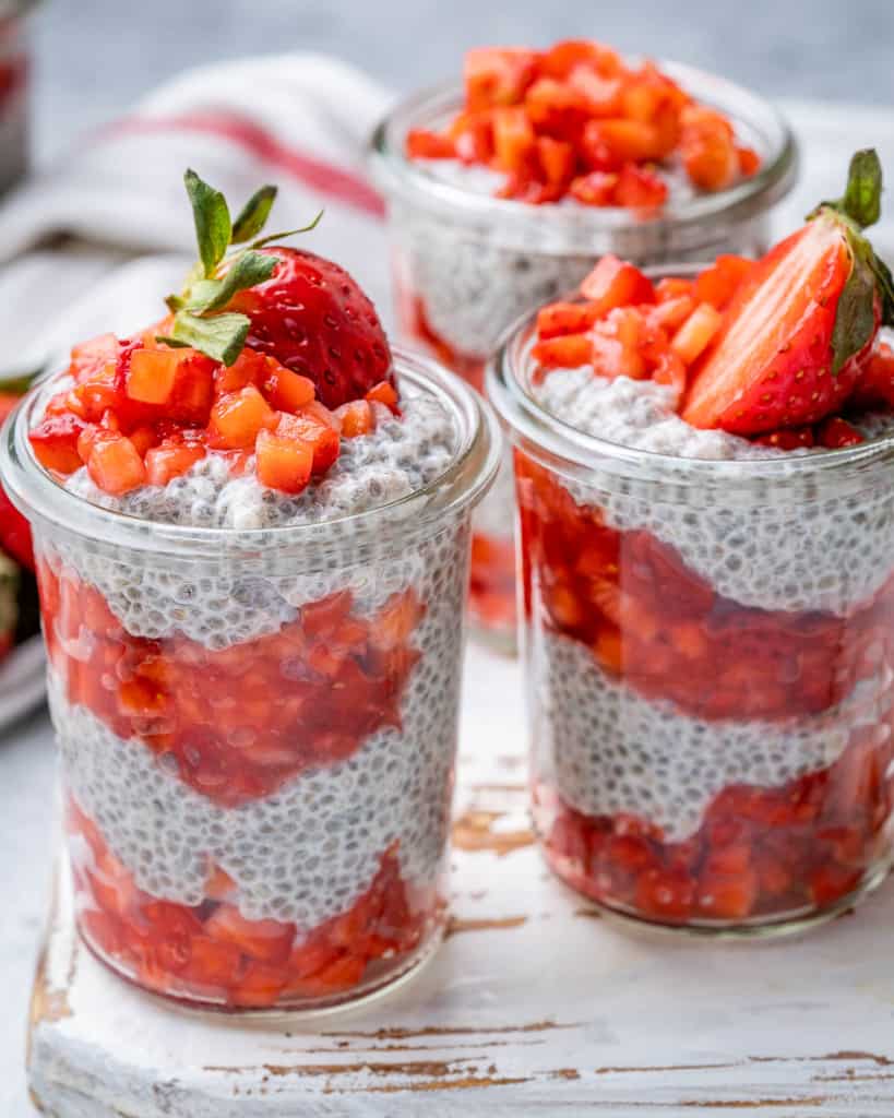 close up image of chia pudding with strawberries 