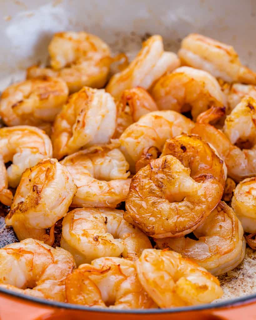 sauteed shrimp before adding the pesto sauce and tomatoes 