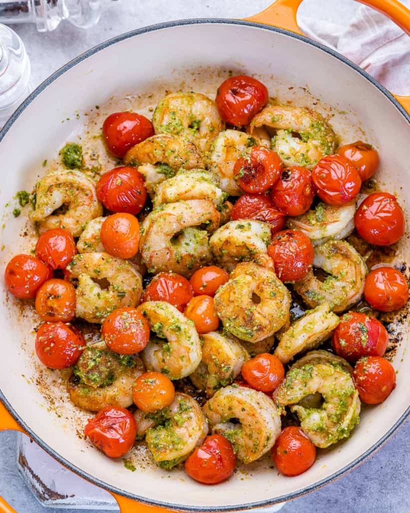 top view sauteed shrimp with pesto and tomatoes 