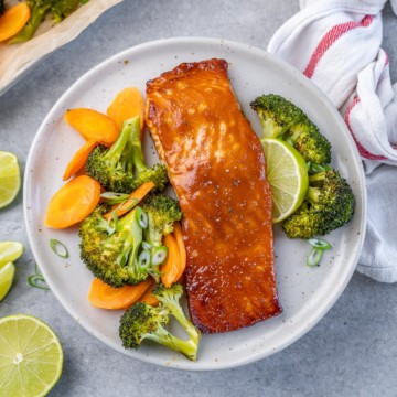 top view of miso glazed salmon with broccoli and carrots