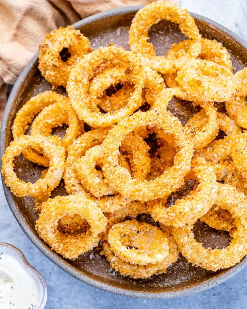 top view onion rings on a gray plate 