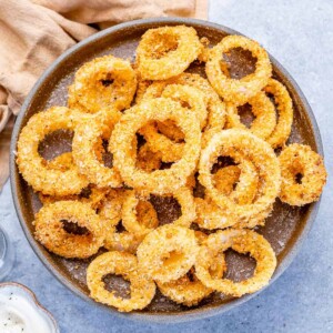 top view onion rings on a gray plate