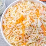 top view close up image of close slaw salad in a white bowl