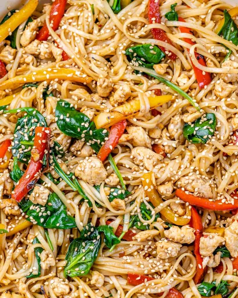 close up chicken lo mien with veggies in a skillet