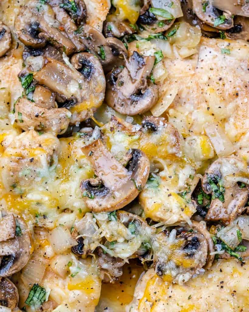 close up chicken and mushroom with melted cheese