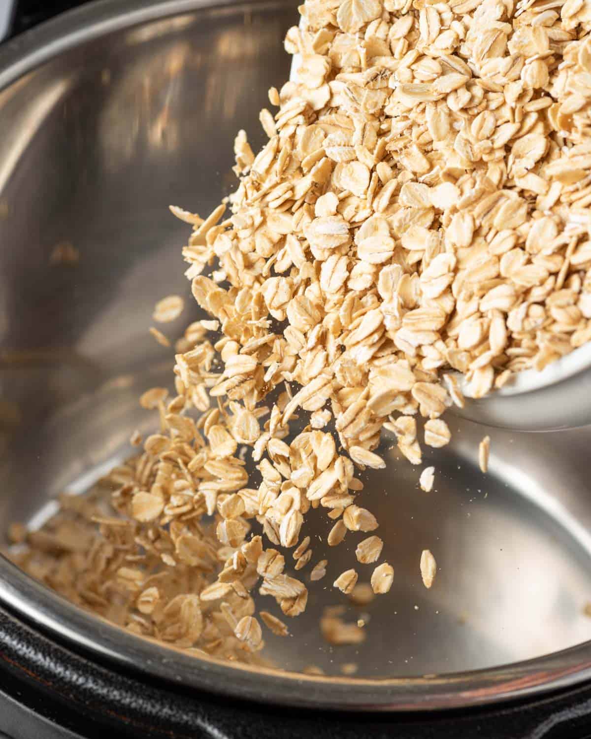 oats being added into the instant pot.