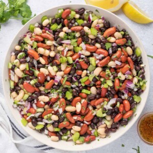 top view image of 3 bean salad in a white bowl