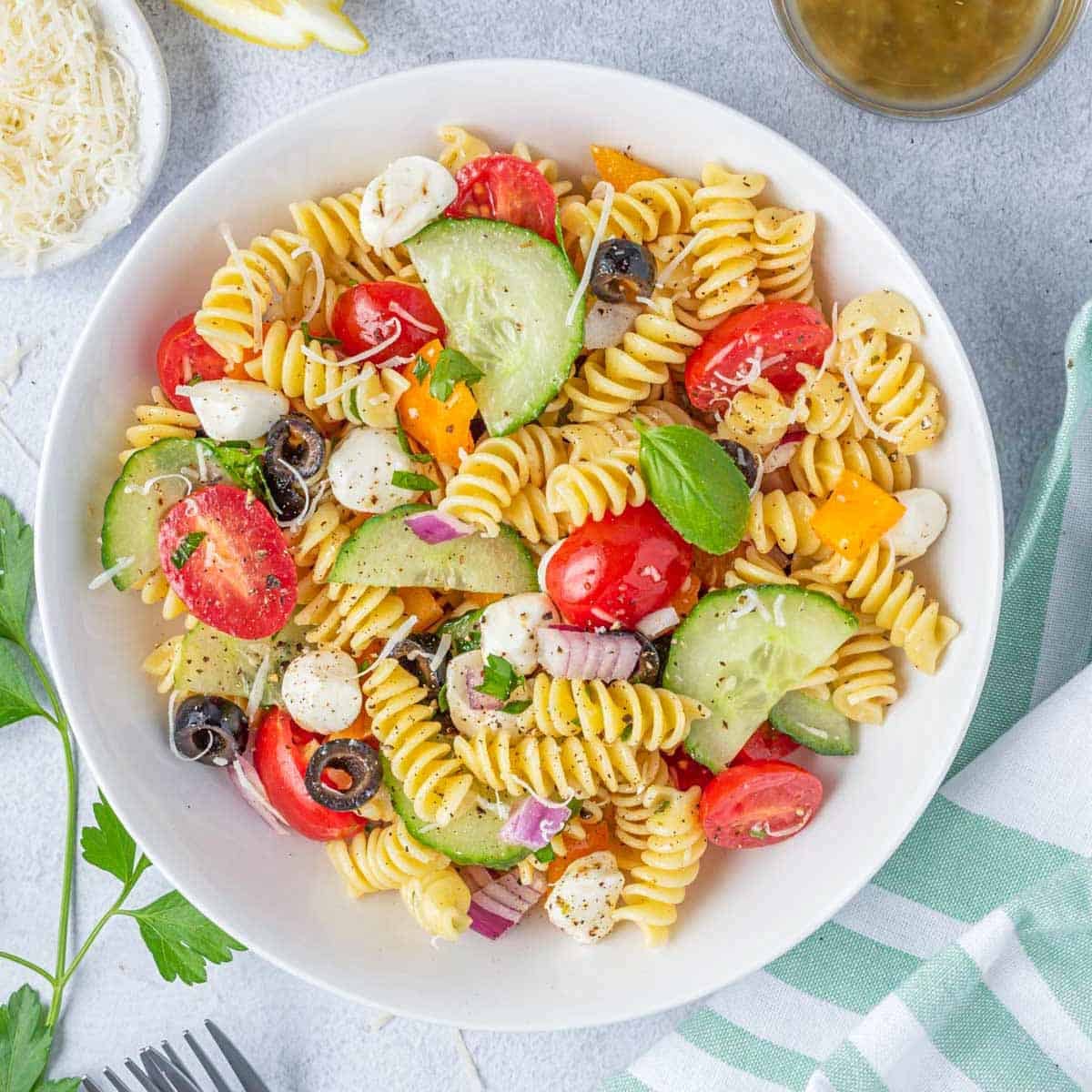 a serving of pasta salad in a round bowl.