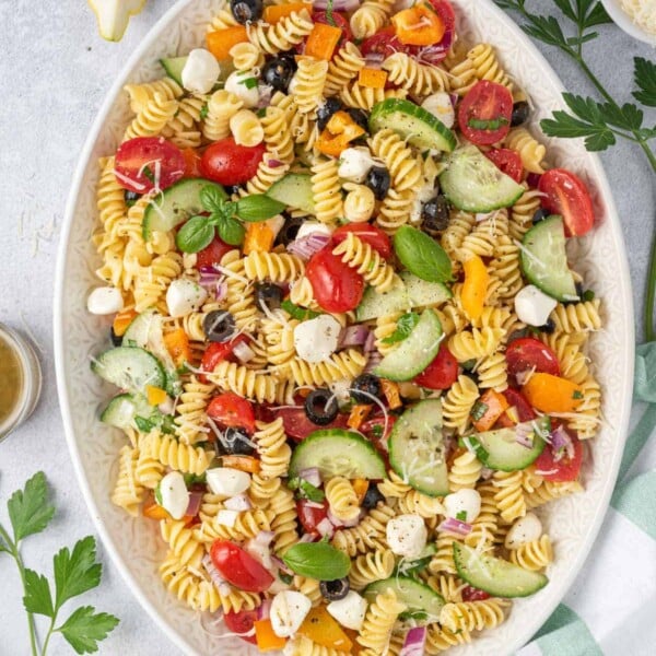 top view pasta salad in a white dish
