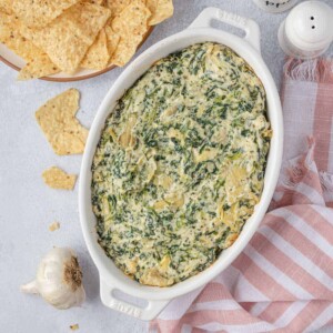 top view spinach and artichoke dip in a dish
