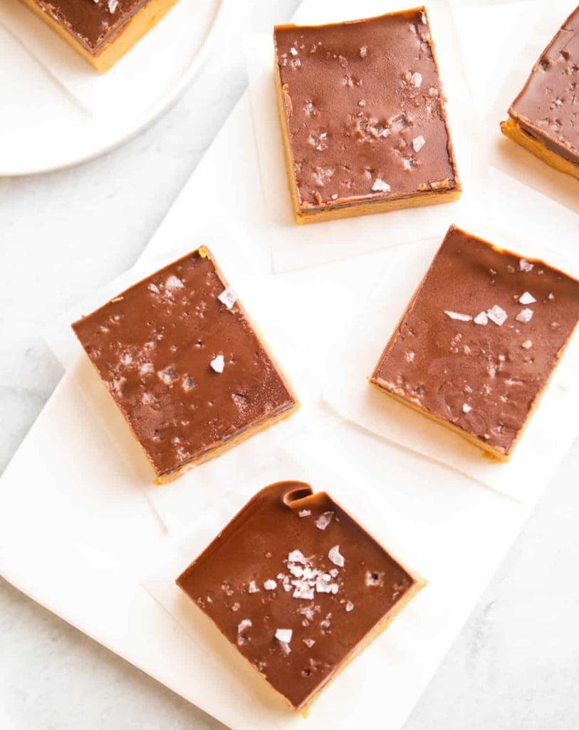 top view of peanut butter bars on a white platter 