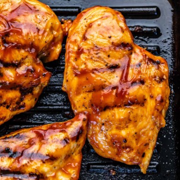 top view BBQ grilled chicken breast on a grill pan