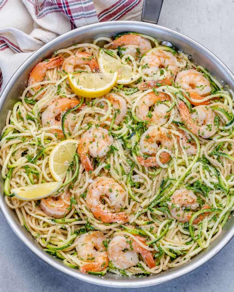 pan filled with lemon garlic shrimp pasta and zucchini noodles