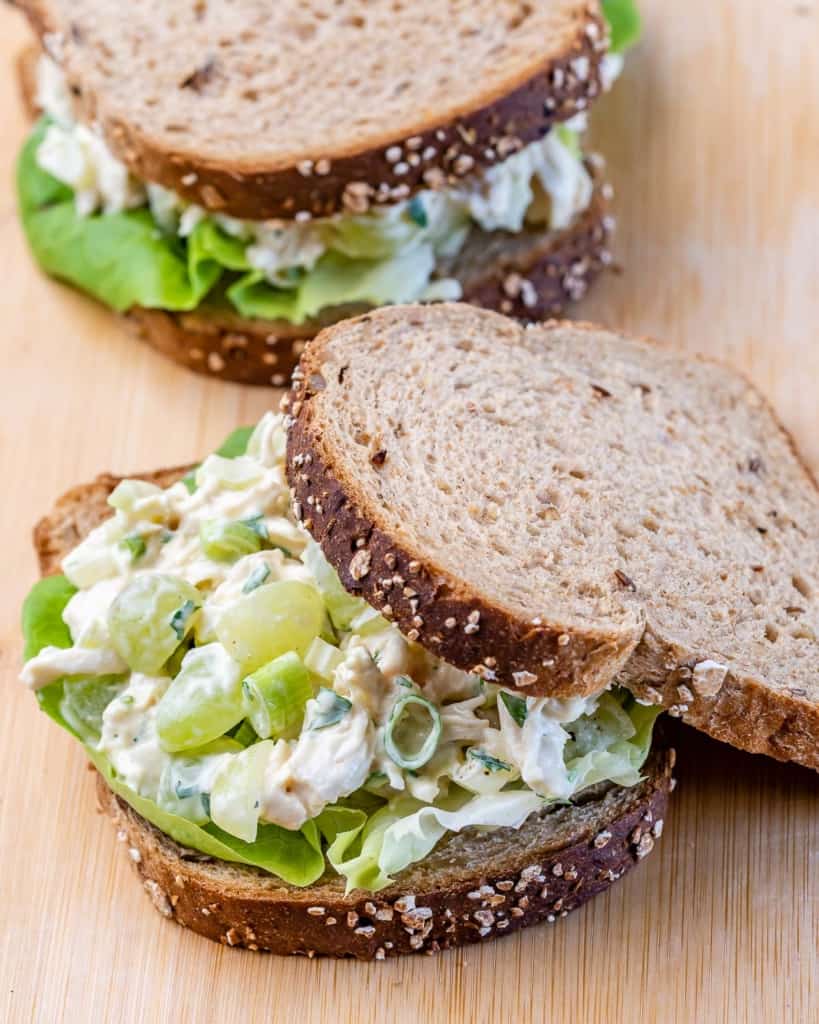 Chicken salad with grapes on whole wheat bread.