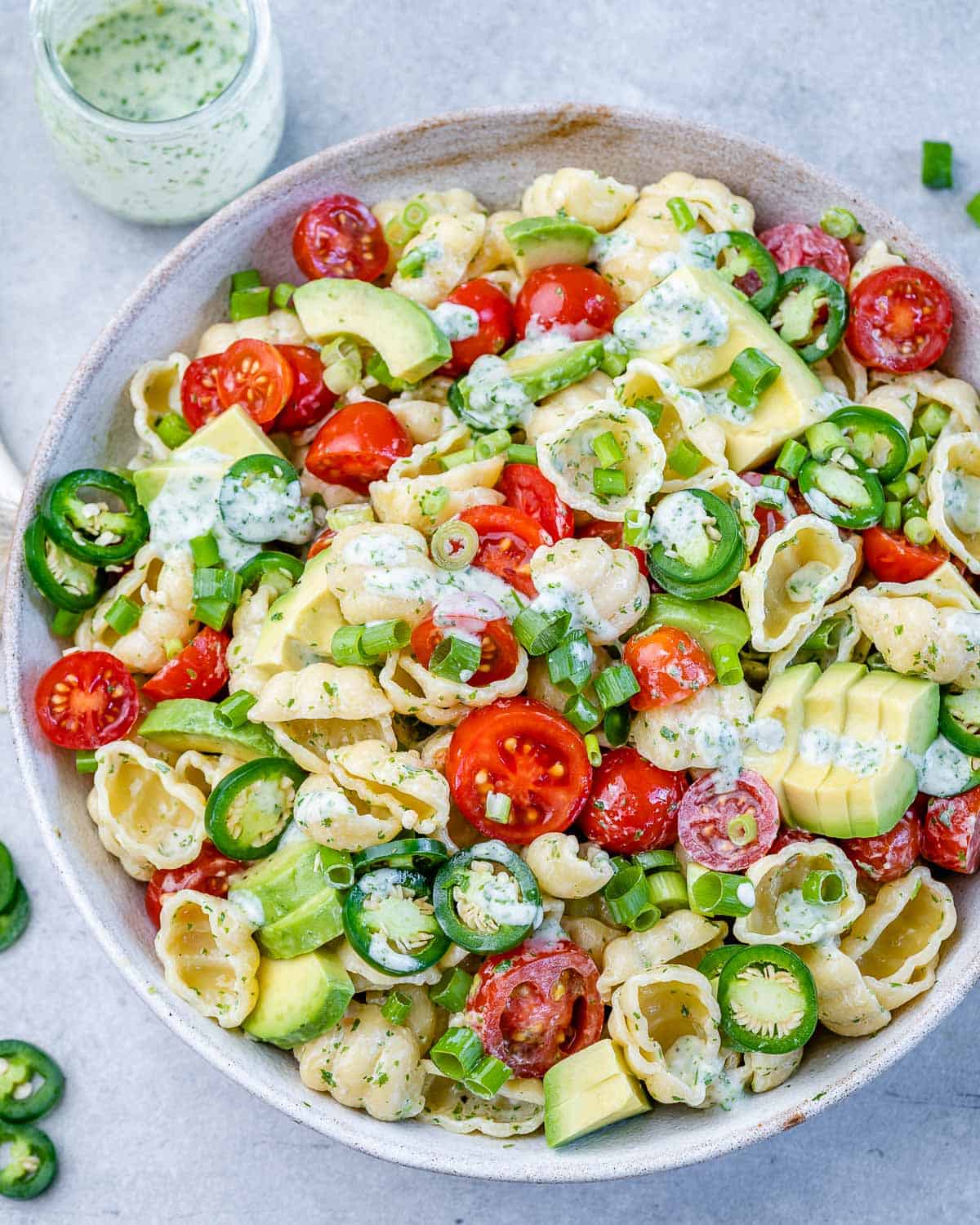 cilantro lime pasta salad in bowl with creamy dressing