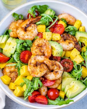 top view shrimp salad in a white bowl