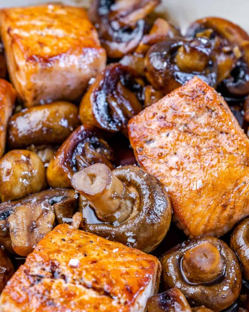 close view of honey balsamic glazed salmon with mushrooms