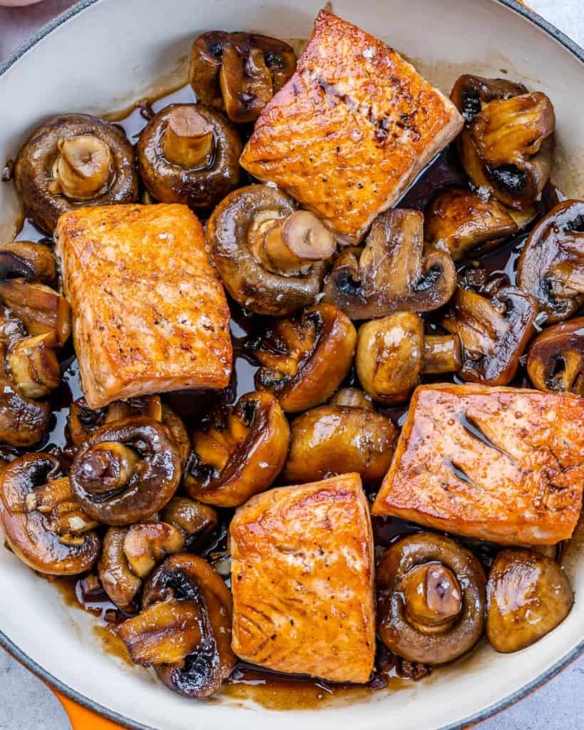 top view of honey balsamic glazed salmon with mushrooms