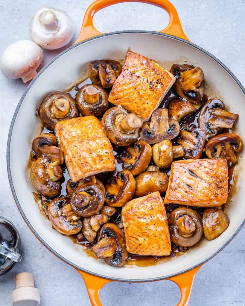 skillet with honey balsamic glazed salmon and mushrooms