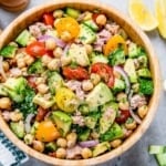 top view chickpea and tuna salad in a brown wooden bowl