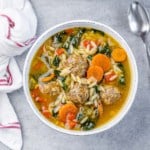 top view of italian wedding soup in a white bowl