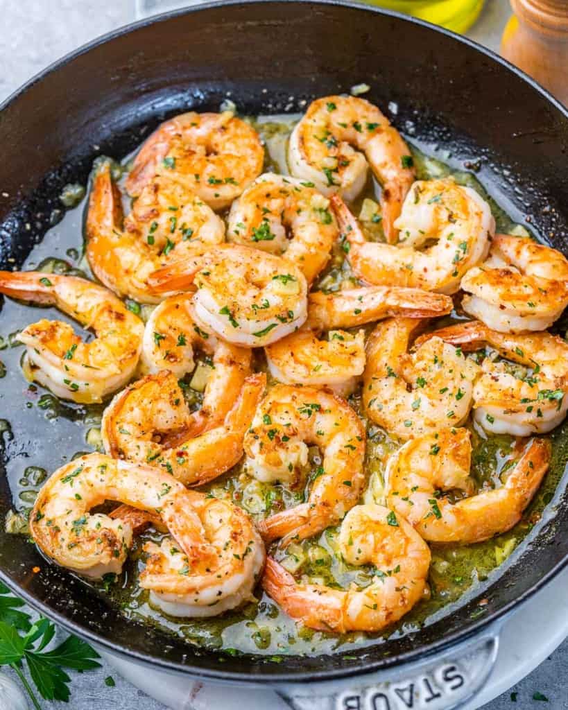 top view shrimp cooked in a black skillet