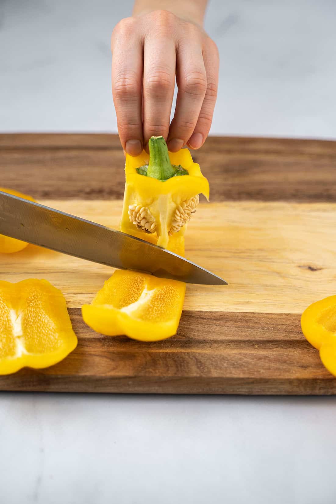 slicing the side of the bell pepper