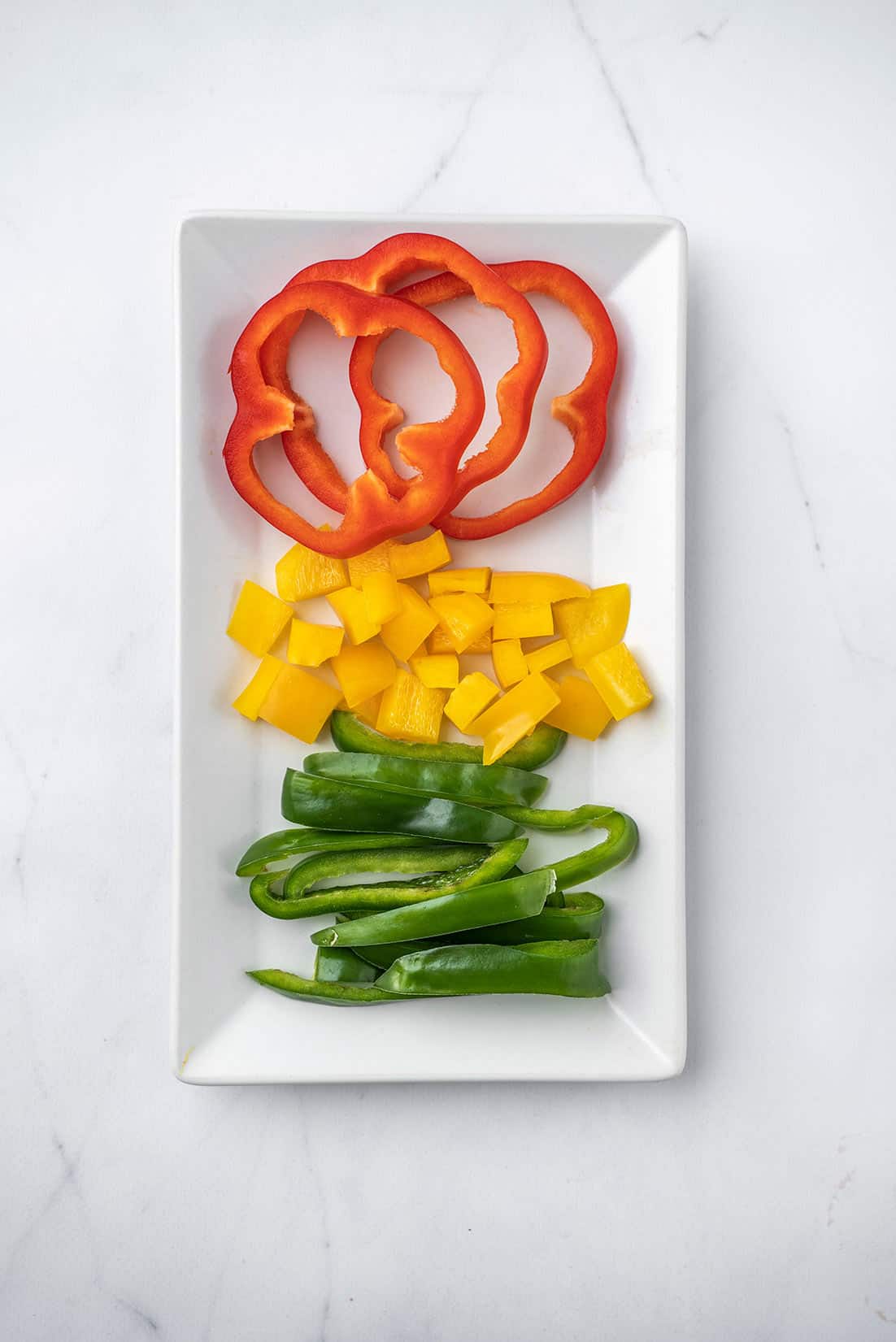 sliced bell pepper on white plate 