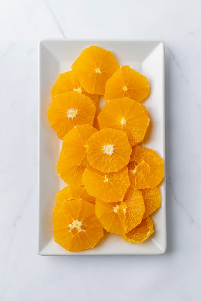 orange slices on white plate 
