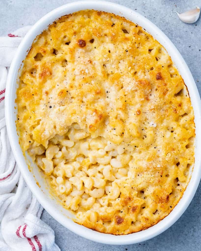 Macaroni and cheese in a white oval dish.