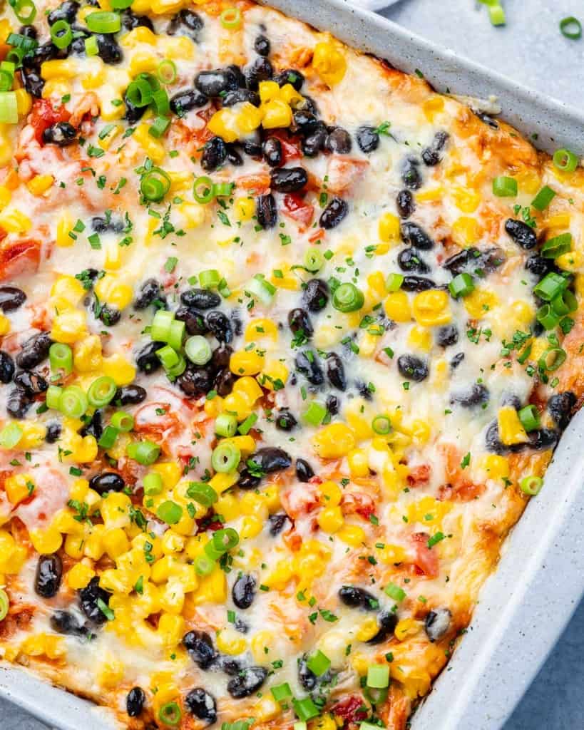 Cheesy casserole with black beans, corn and chicken.