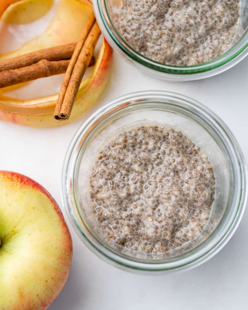 chia pudding in a jar before adding apple pie topping