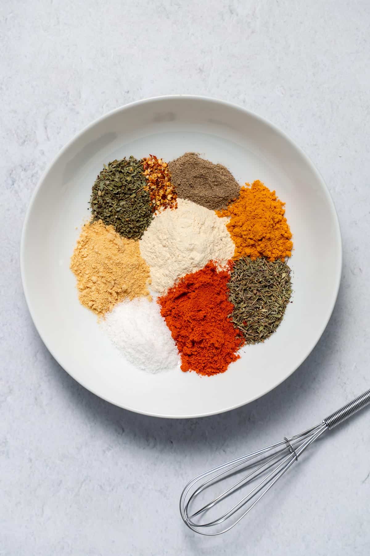 spices in bowl with whisk to the side