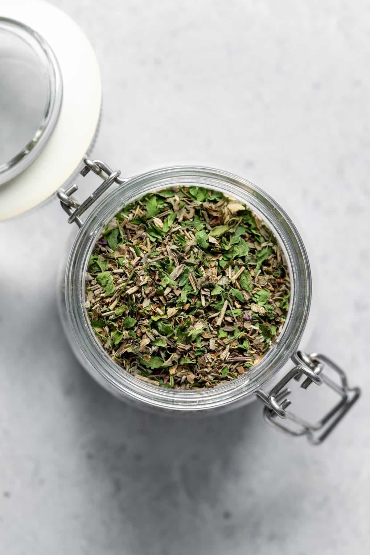 jar filled with dried herbs 
