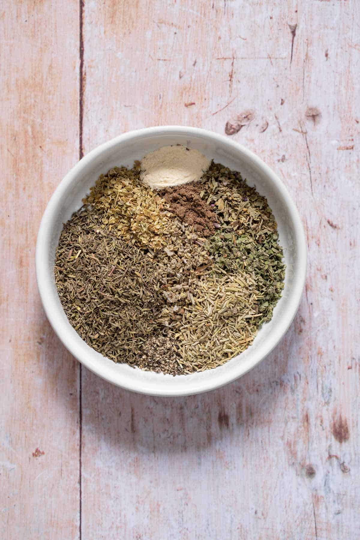 dried herbs placed in a bowl 