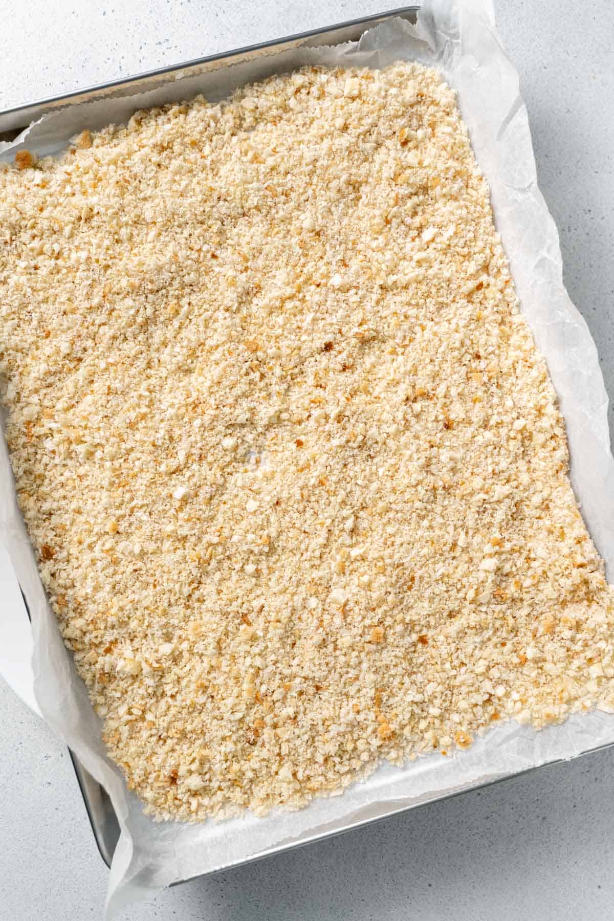 bread crumbs on baking sheet