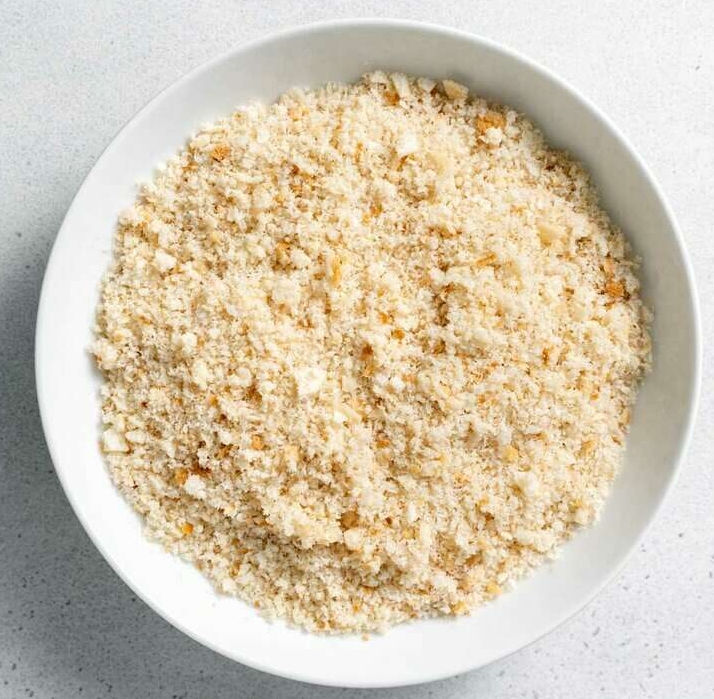 top view of breadcrumbs in a white bowl