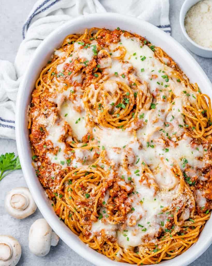 top view of baked spaghetti in a white dish