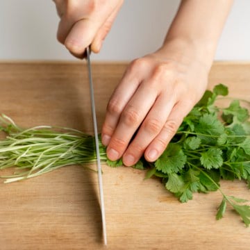 chopping cilantro stems