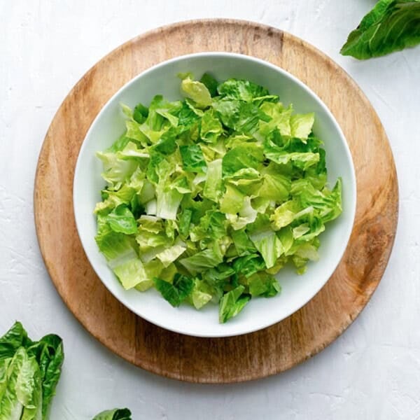 chopped romaine lettuce on a plate.