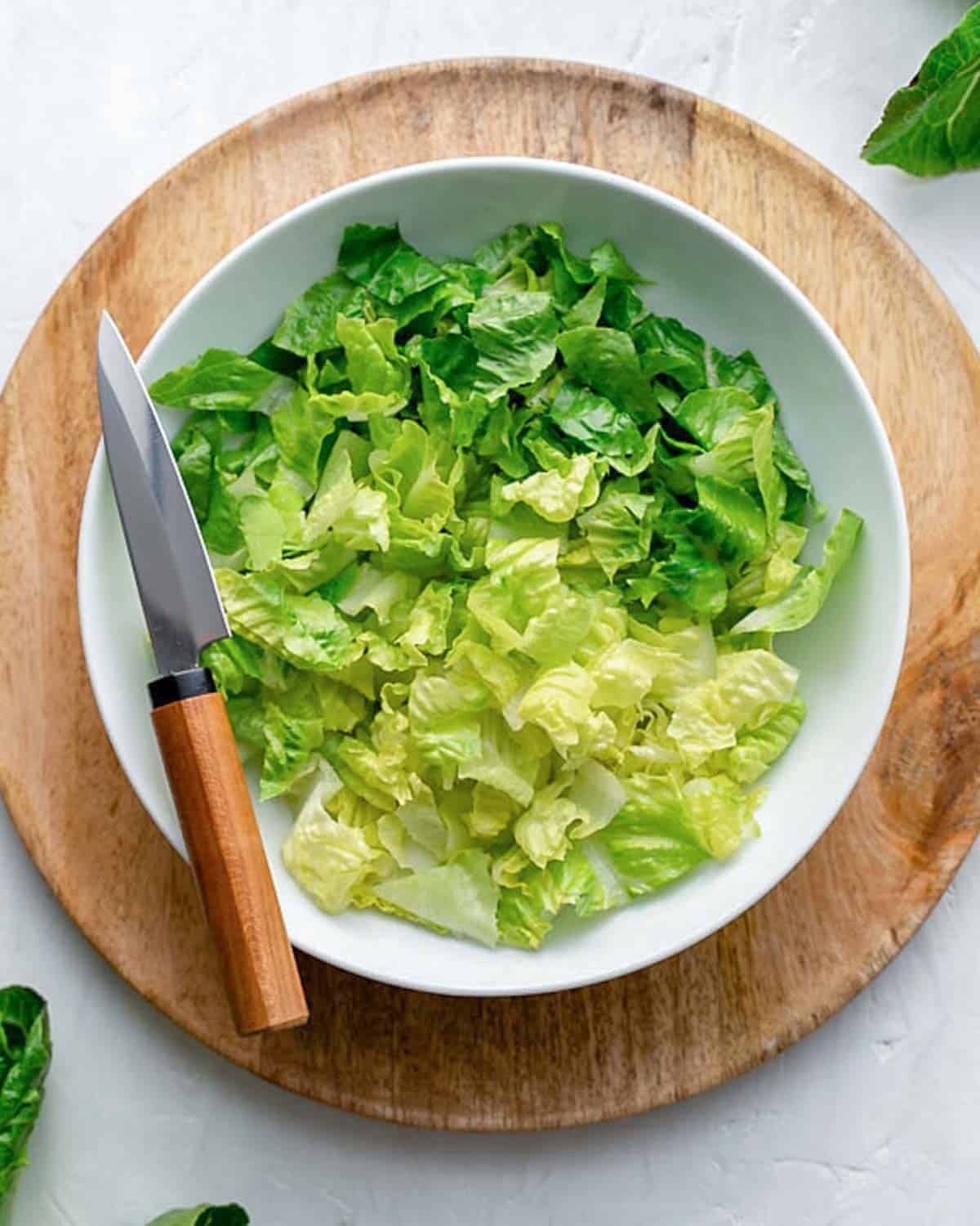 chopped romaine lettuce on a plate.