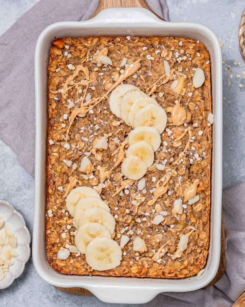 top view baked oatmeal topped with sliced banana
