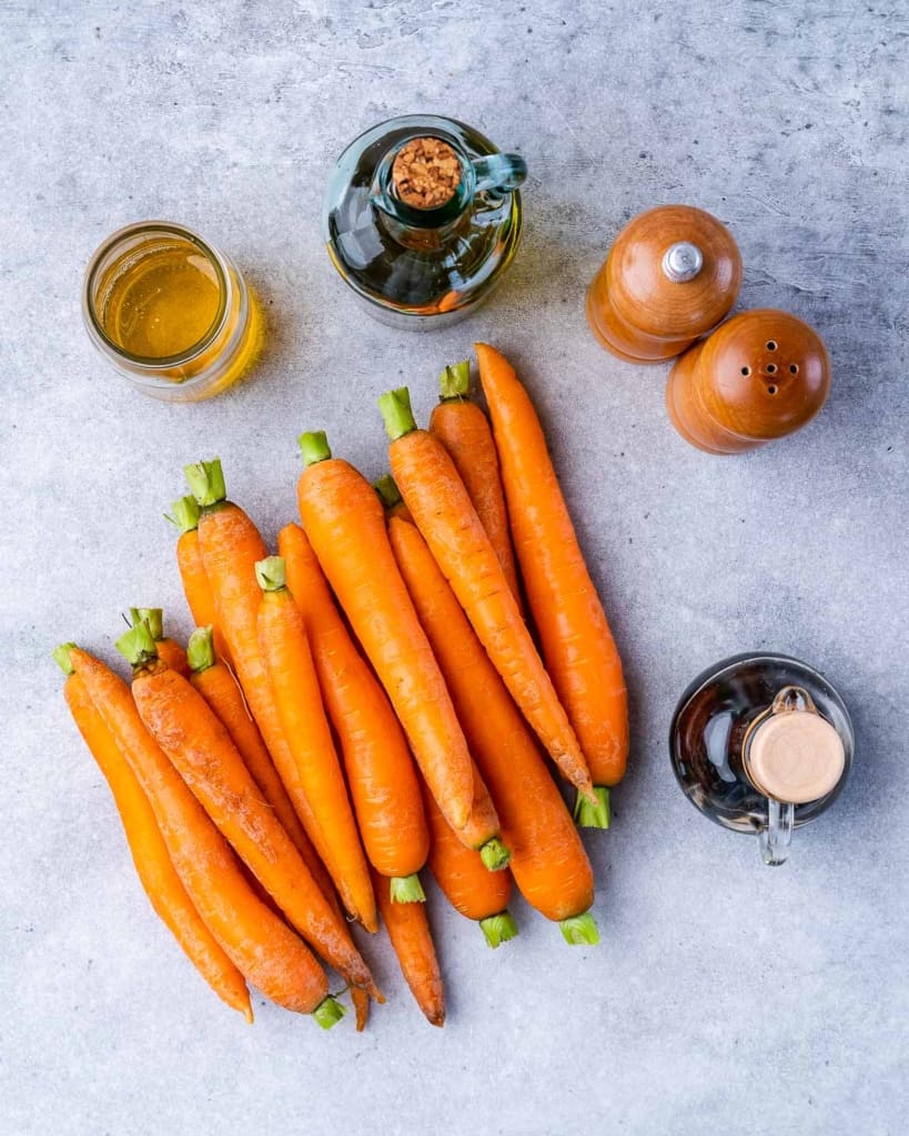Carrots cut lengthwise with oil, vinegar, salt and pepper.