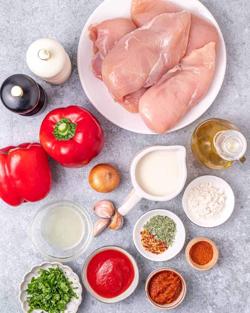 Ingredients portioned into small bowls for making peri peri chicken.